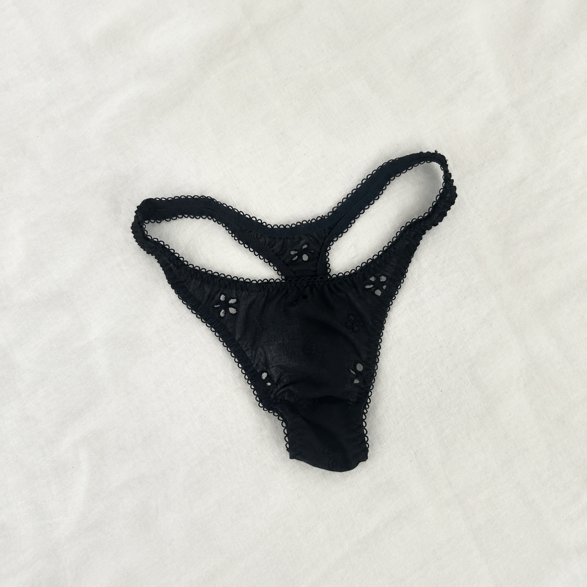 EMMYLOU BLACK EYELET COTTON THONG